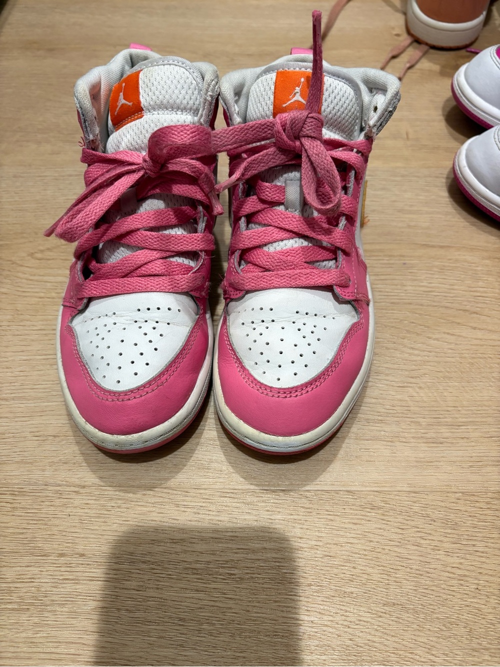 Nike Kids Pink and White High-Top Sneakers with Orange Logo